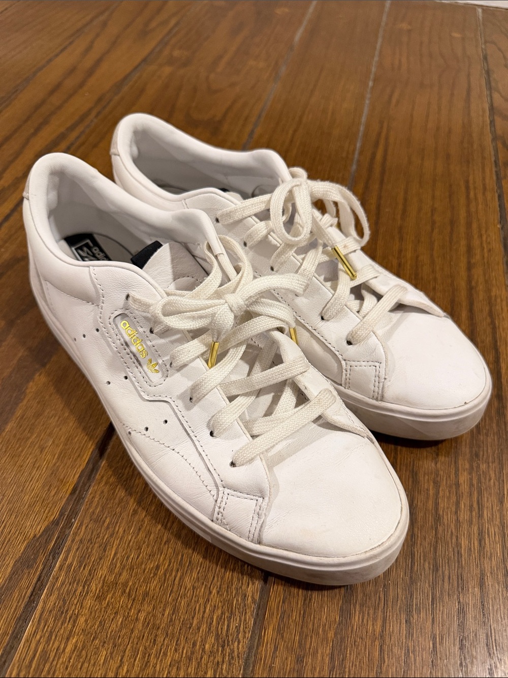 adidas White Leather Sneakers with Gold Accents